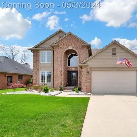 Buy this 4 bed house on 48041 Daisy Drive in Macomb Township, MI 48044