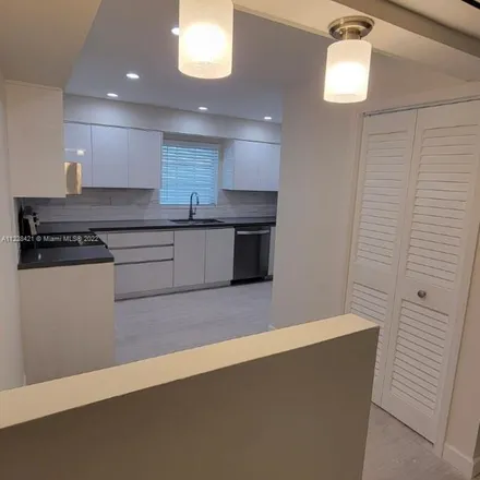 Rent this 3 bed apartment on 1119 Cotorro Avenue in Coral Gables, FL 33146