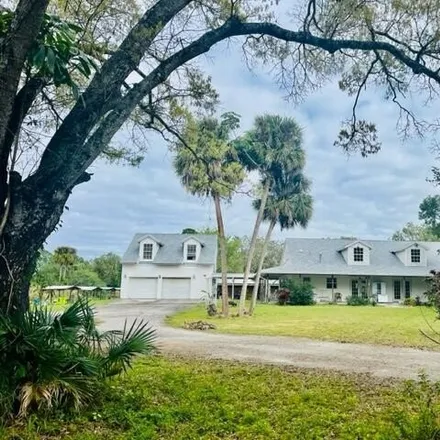 Buy this 4 bed house on 14005 Tripp Road North in Loxahatchee Groves, FL 33470