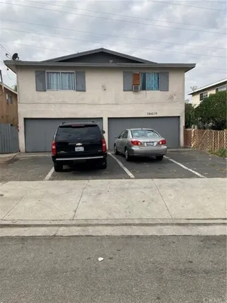 Buy this 5 bed townhouse on 16687 South Denver Avenue in Los Angeles, CA 90248
