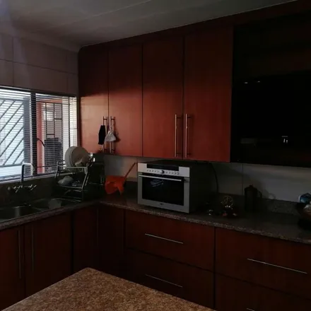 Rent this 4 bed apartment on Dubloon Avenue in Wilgeheuwel, Roodepoort