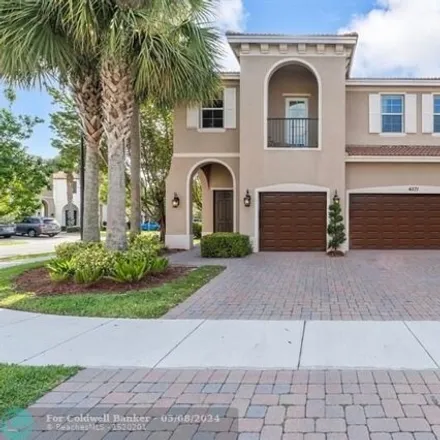 Buy this 5 bed house on 4553 San Mellina Drive in Coconut Creek, FL 33073