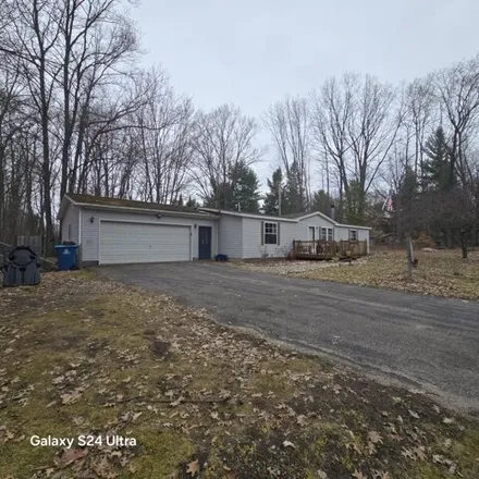 Buy this 3 bed house on 100 Burning Oak Ct in Roscommon, Michigan