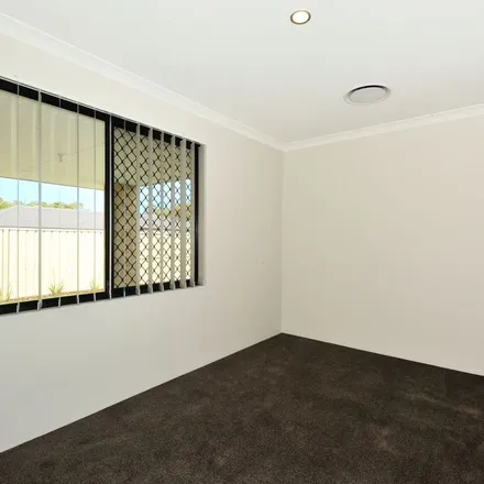 Rent this 4 bed apartment on Worlington Loop in Meadow Springs WA 6180, Australia