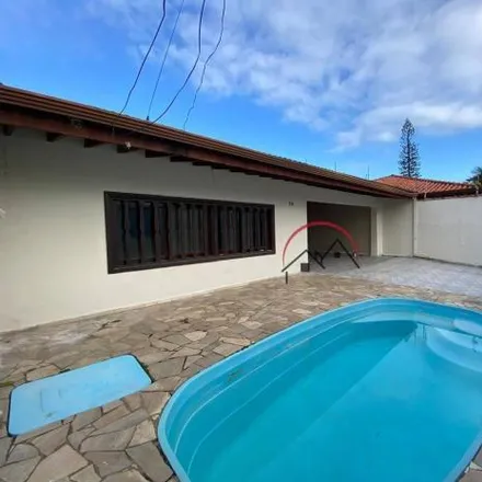 Rent this 3 bed house on Rua General Osório in Jardim Marcia I, Peruíbe - SP