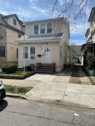 Buy this 4 bed townhouse on 1366 East 31st Street in New York, NY 11210