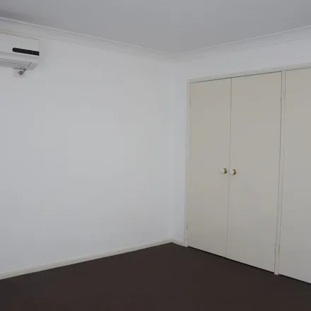 Rent this 3 bed townhouse on Proserpine Close in Ashtonfield NSW 2323, Australia