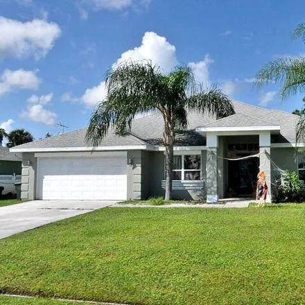 Buy this 4 bed house on 563 Southeast Damask Avenue in Port Saint Lucie, FL 34983