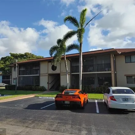 Rent this 2 bed condo on 10725 W Clairmont Cir Unit 111 in Tamarac, Florida