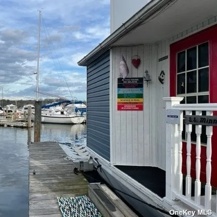 Buy this 2 bed house on Tom's Point Marina in Matinecock Avenue, Village of Manorhaven