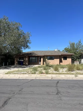 Buy this 4 bed house on 10319 Woodland Avenue Northeast in Matheson Park, Albuquerque