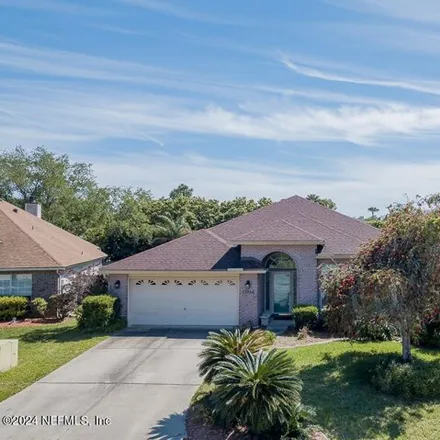 Rent this 4 bed house on 13966 Sandhill Crane Drive South in Jacksonville, FL 32224