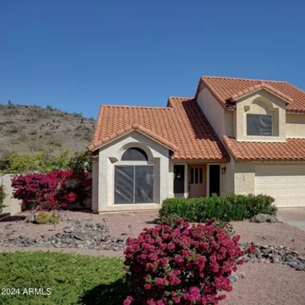 Buy this 4 bed house on 4136 East Thistle Landing Drive in Phoenix, AZ 85044