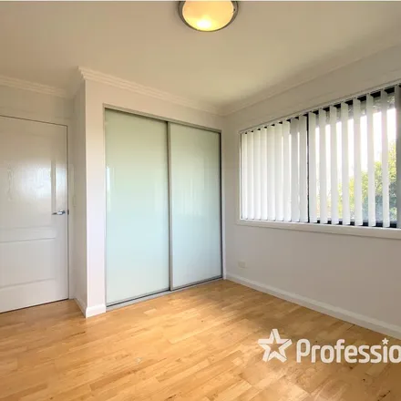 Rent this 4 bed townhouse on unnamed road in Casula NSW 2170, Australia