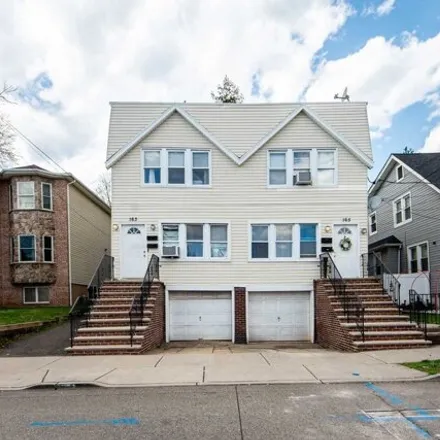 Buy this 8 bed house on 171 Jefferson Street in Wood-Ridge, Bergen County