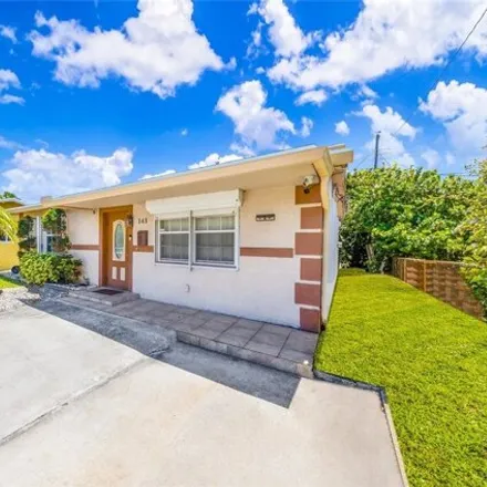 Buy this 4 bed house on 765 Southwest 3rd Street in Dania Beach, FL 33004