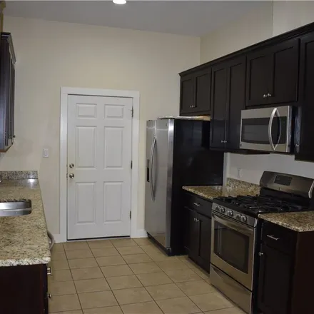 Rent this 3 bed apartment on 1309 Olander Street in Austin, TX 78702