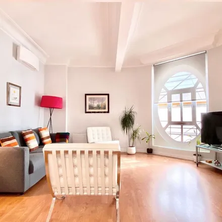Rent this 1 bed apartment on Madrid in Palacio de la Prensa, Calle de los Tudescos