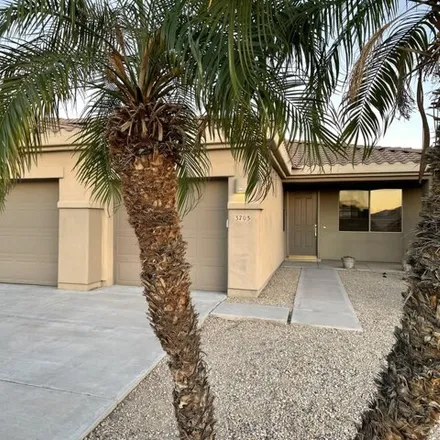 Rent this 4 bed house on 3703 North 145th Drive in Goodyear, AZ 85395