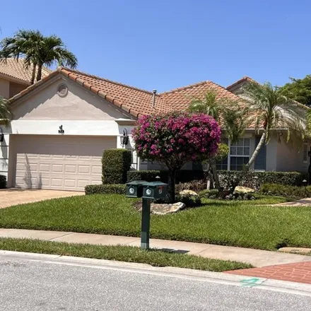 Buy this 4 bed house on 867 Augusta Pointe Drive in Palm Beach Gardens, FL 33418