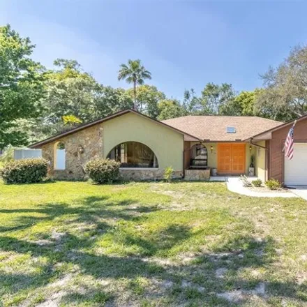 Buy this 3 bed house on 12298 Deep Creek Drive in Spring Hill, FL 34609