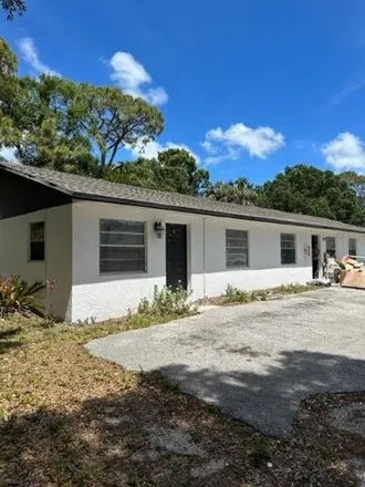 Rent this 2 bed apartment on 5034 Sanibel Avenue in Lakewood Park, FL 34951