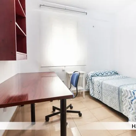 Rent this 2 bed room on Calle Santo Ángel in 7, 41010 Seville