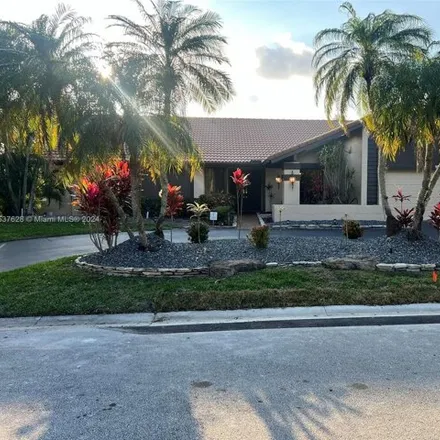 Rent this 4 bed house on 1000 Northwest 113th Way in Coral Springs, FL 33071