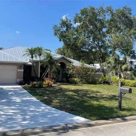 Buy this 4 bed house on 4426 SW Oakhaven Ln in Palm City, Florida