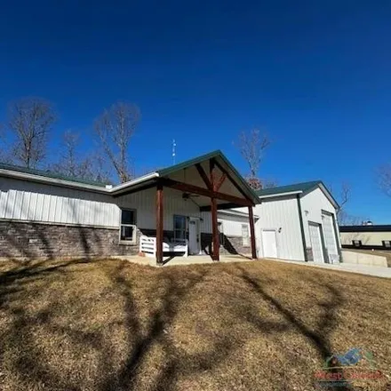 Buy this 3 bed house on 14587 Lupine Loop in Benton County, MO 65355