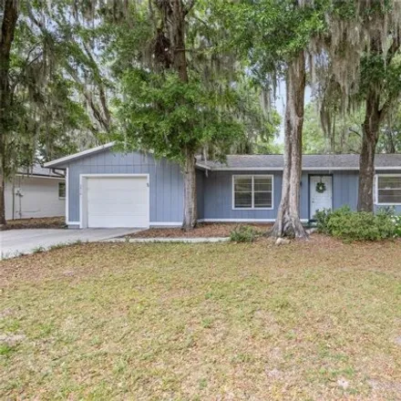 Buy this 3 bed house on 2416 Northwest 54th Terrace in Alachua County, FL 32606