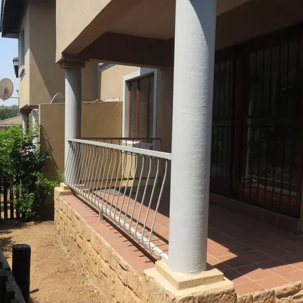 Rent this 3 bed townhouse on Isipingo Road in Paulshof, Sandton