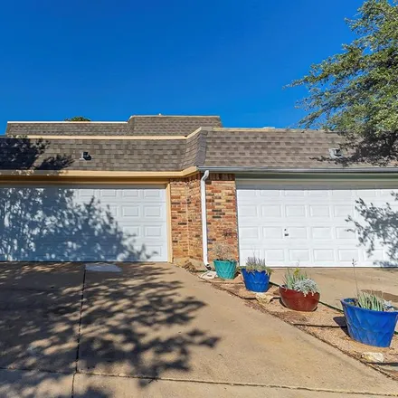Buy this 3 bed townhouse on 2805 Summit View Drive in Bedford, TX 76021