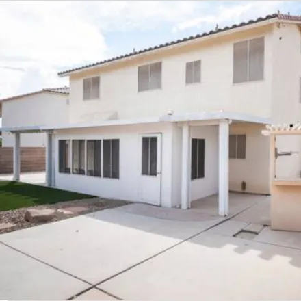Rent this 4 bed house on 6551 Aztec Rose Way