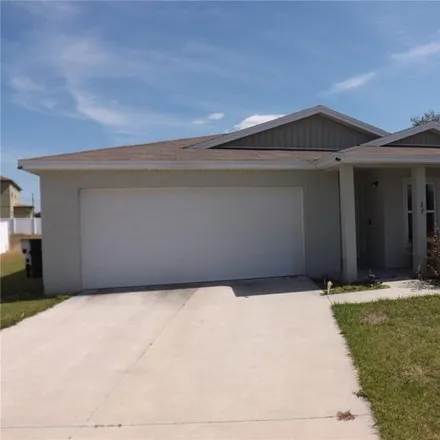 Rent this 4 bed house on Lake Marion Creek Drive in Polk County, FL 33840