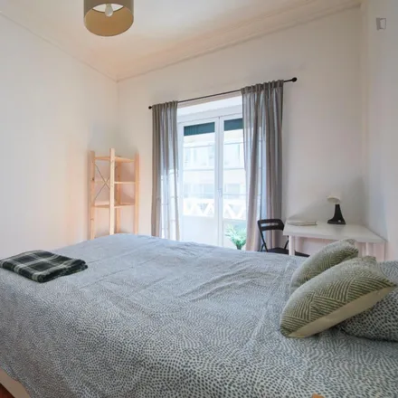Rent this 6 bed room on Rua Augusto Gil in Lisbon, Portugal