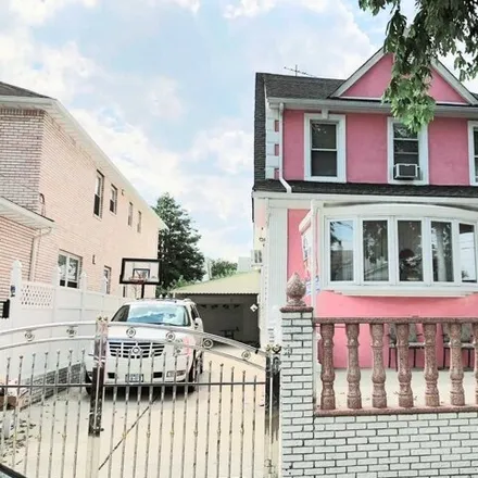 Buy this 7 bed house on 111-34 122nd Street in New York, NY 11420