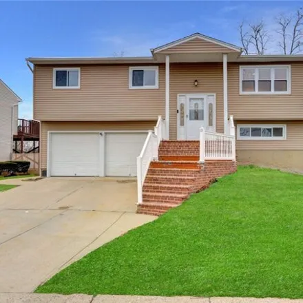 Buy this 4 bed house on 3 Ozone Place in East Massapequa, NY 11758