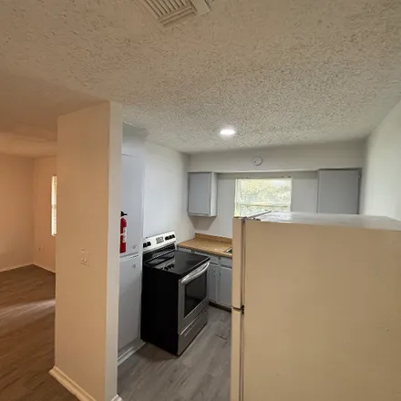 Rent this 1 bed condo on 13713 Duncum St