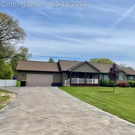 Buy this 3 bed house on 11269 Cedar Island Road in White Lake Charter Township, MI 48386