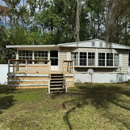Buy this studio apartment on 24133 Fox Road in Lake County, FL 32102