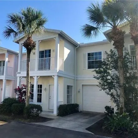 Rent this 3 bed townhouse on 3294 Megan Ln Apt 3 in Naples, Florida