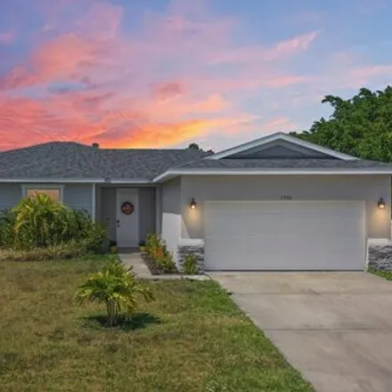 Buy this 4 bed house on 1654 Southwest Cordova Street in Port Saint Lucie, FL 34987