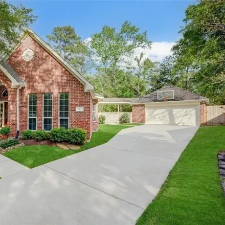 Buy this 4 bed house on 11149 Falconwing Drive in Indian Springs, The Woodlands
