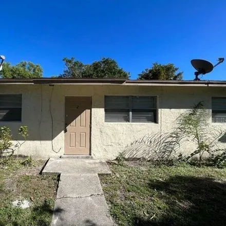 Rent this 2 bed house on 1212 15th Ave N Apt 2 in Lake Worth, Florida
