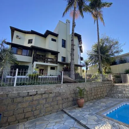 Rent this 5 bed house on Rua Margot Ganzo Araújo in Centro, Florianópolis - SC