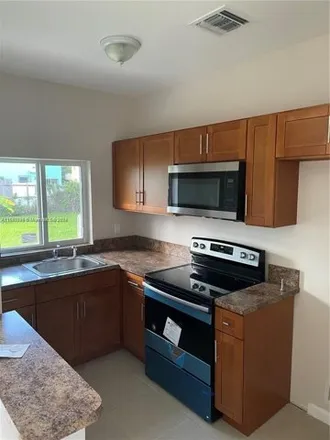 Rent this 2 bed apartment on 8321 Northeast Miami Court in Little River, Miami