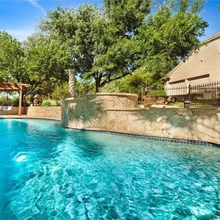 Buy this 4 bed house on 5120 Eagle Trace Trail in Austin, TX 78730