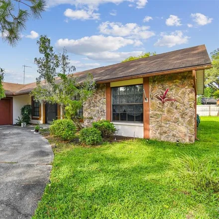 Buy this 3 bed house on 835 Rustic Oaks Drive in Palm Harbor, FL 34684
