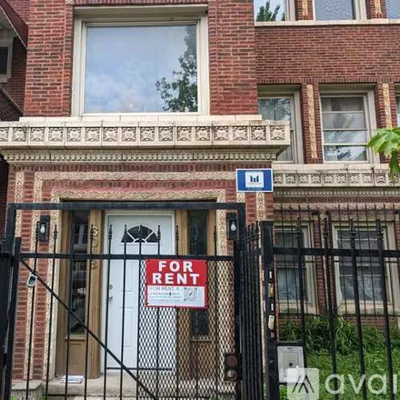 Rent this 4 bed apartment on 6018 S St Lawrence Ave